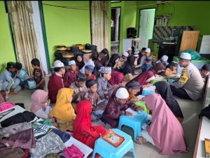 Aiptu Andi Yusnar, Kelola TPA, 11 Santriwan Santriwati di Khatamkan Quran