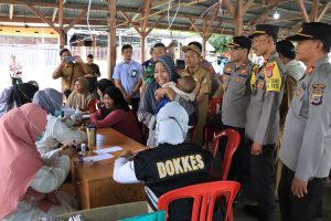 HUT Bhayangkara Ke -78, Polres Touna Gelar bantuan sosial dan bakti kesehatan
